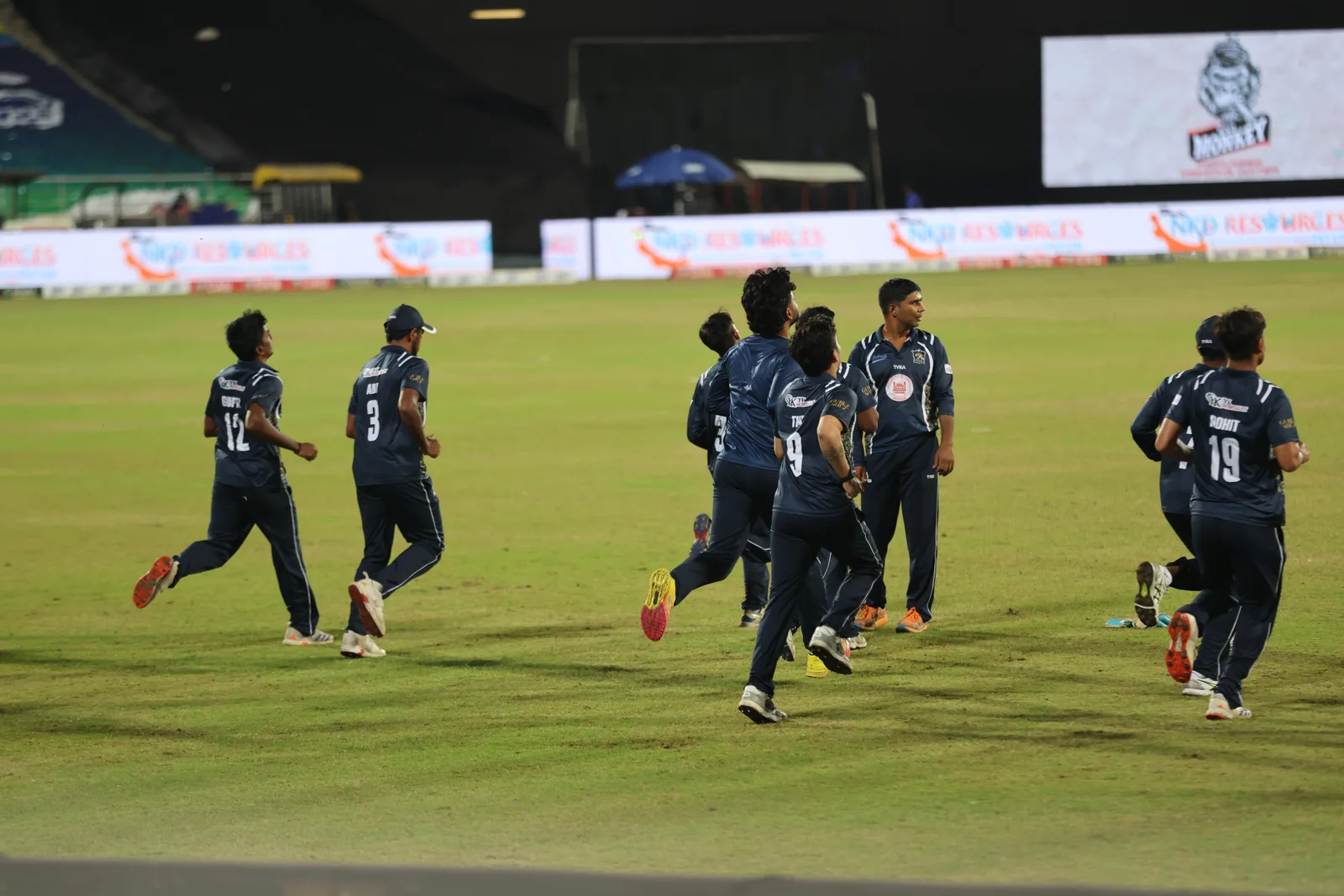 Nainital Tigers players running together on the field